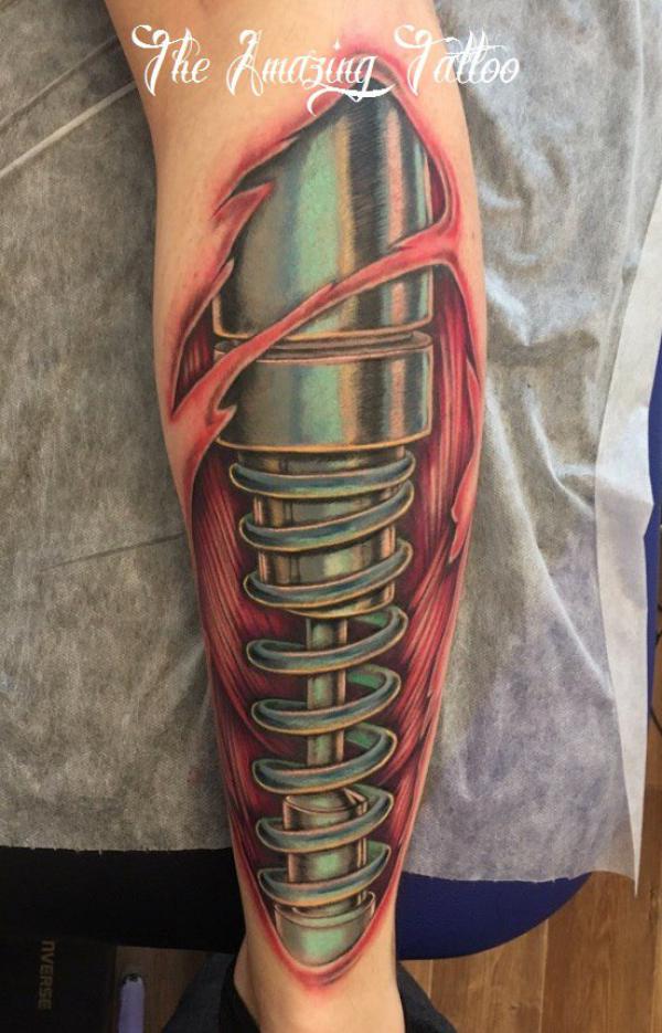 The Intriguing Significance of a Mechanic Leg Tattoo